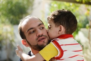 Divorcing dad with his son. Therapist for custody issues and family therapy